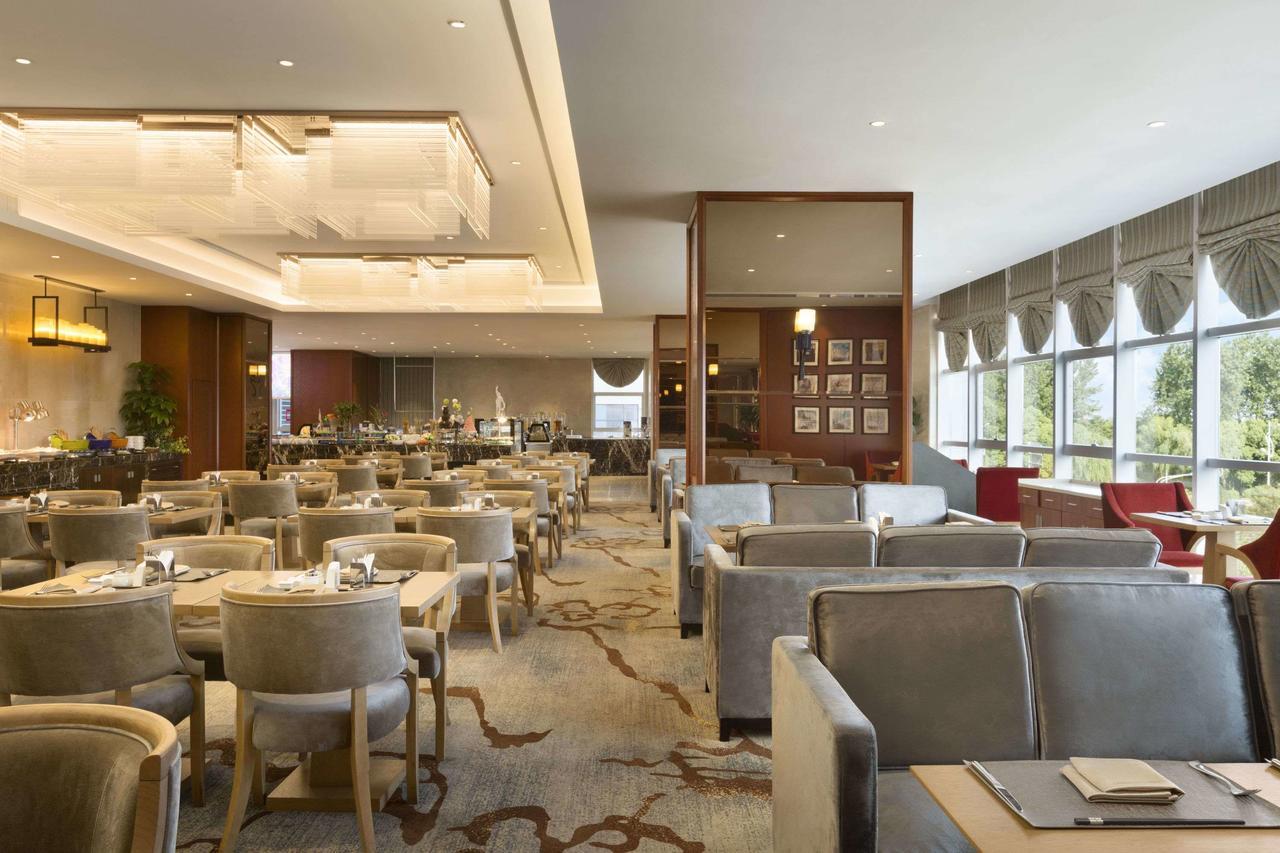 Ramada Jiaxing Hotel Bagian luar foto